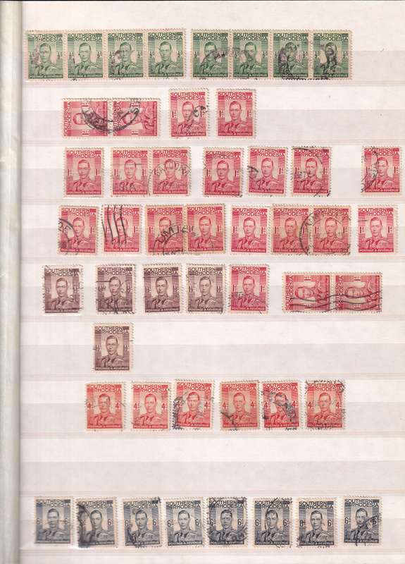 Pronto 32 page stamp album with some Southern Rhodesia stamps , good used condition