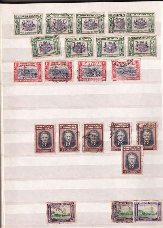 Pronto 32 page stamp album with some Southern Rhodesia stamps , good used condition
