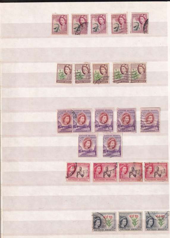 Pronto 32 page stamp album with some Southern Rhodesia stamps , good used condition