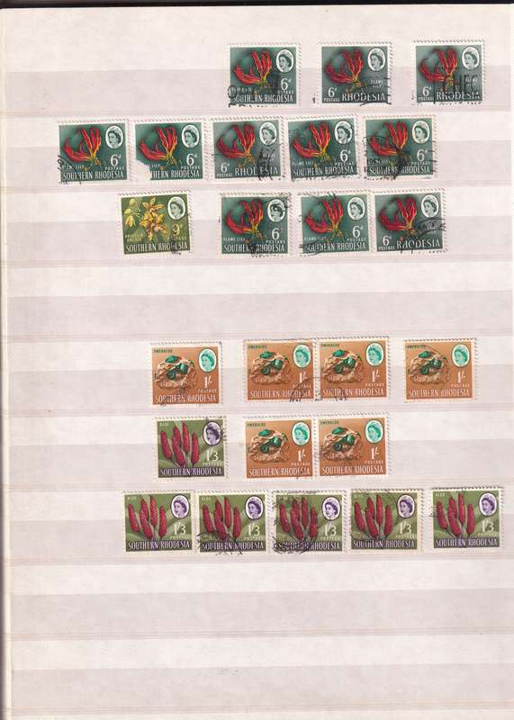 Pronto 32 page stamp album with some Southern Rhodesia stamps , good used condition