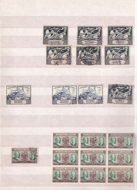Pronto 32 page stamp album with some Southern Rhodesia stamps , good used condition