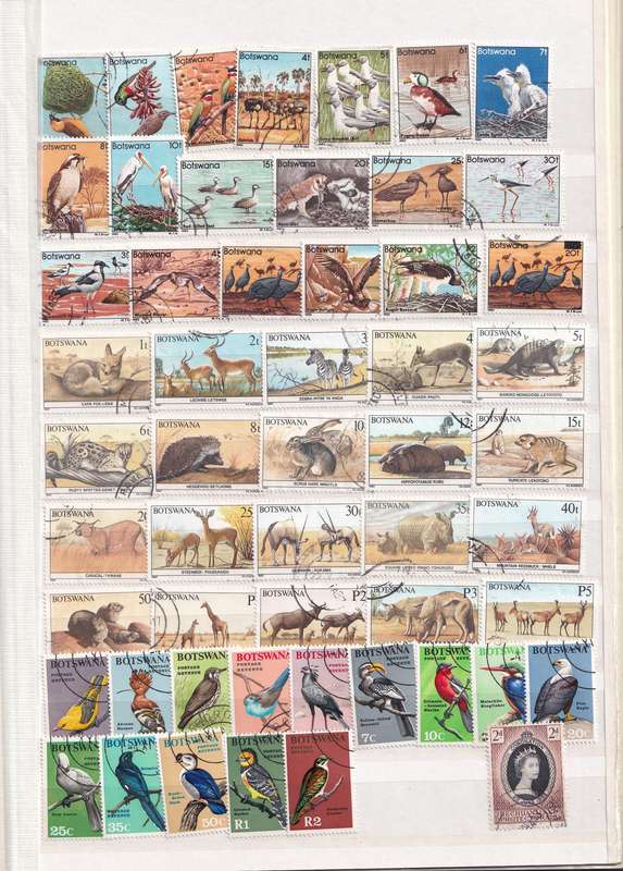 Stamp Album green 16 pages (32 sides) in good used condition filled with used stamps