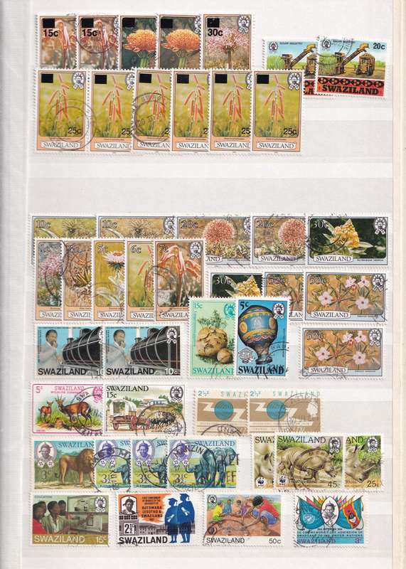 Stamp Album green 16 pages (32 sides) in good used condition filled with used stamps