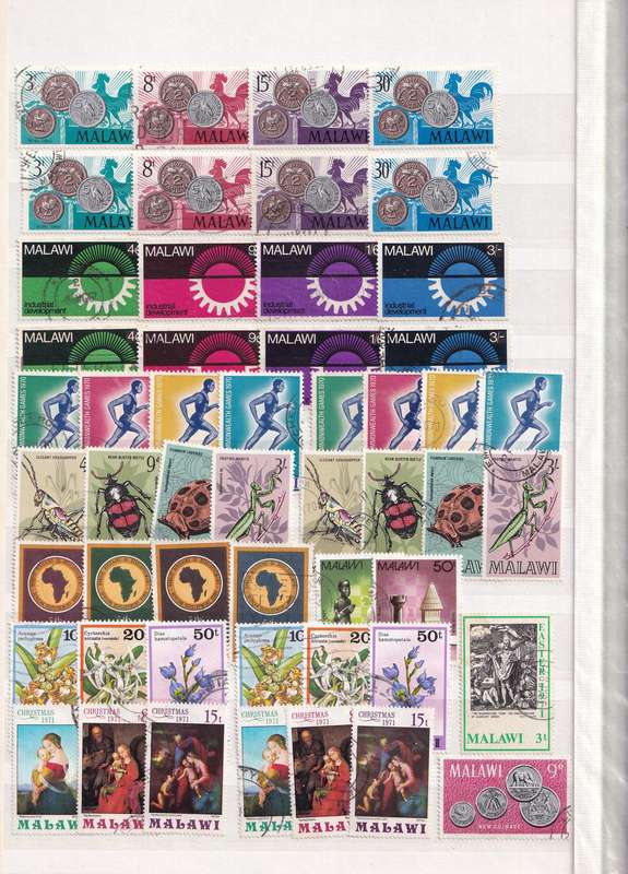 Stamp Album green 16 pages (32 sides) in good used condition filled with used stamps