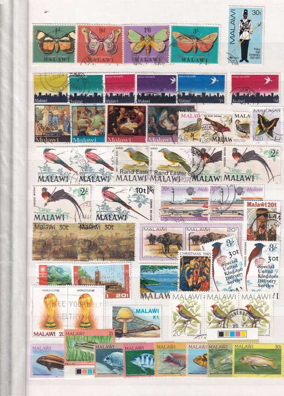 Stamp Album green 16 pages (32 sides) in good used condition filled with used stamps