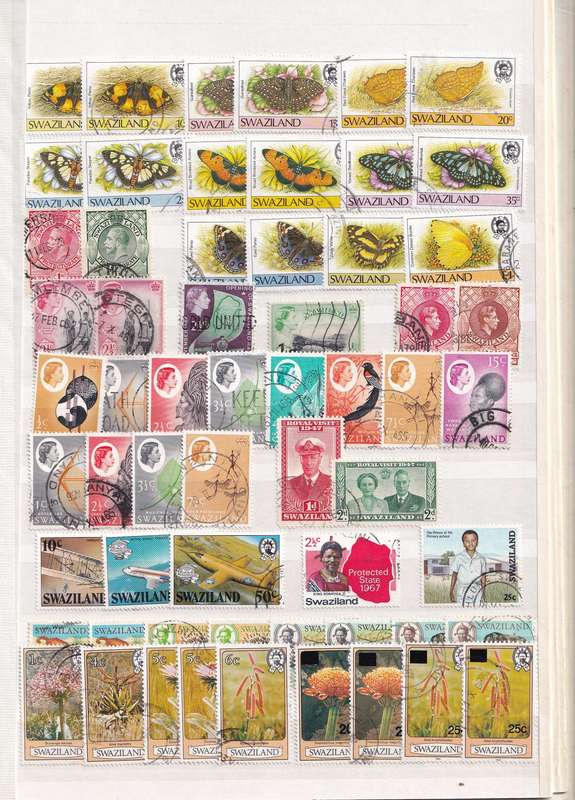 Stamp Album green 16 pages (32 sides) in good used condition filled with used stamps