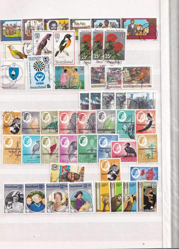 Stamp Album green 16 pages (32 sides) in good used condition filled with used stamps