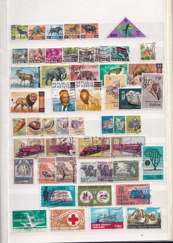 Stamp Album green 16 pages (32 sides) in good used condition filled with used stamps