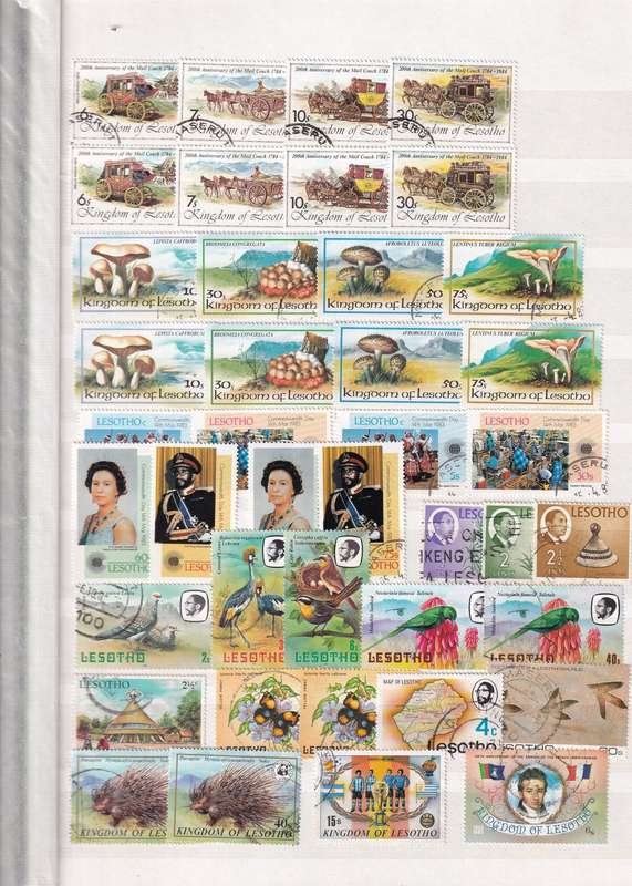 Stamp Album green 16 pages (32 sides) in good used condition filled with used stamps