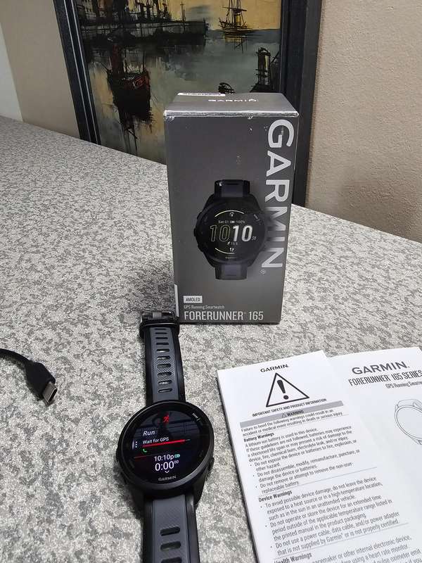 Garmin forerunner 165 GPS 43mm Smart Watch  The watch