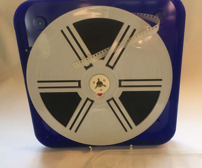 8 mm. CARL SCHNEIDER 180 mm. / 7 ins.  FILM REEL , IN CLEAR CRYSTAL DUST CASE