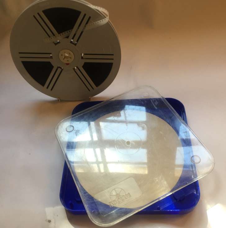 8 mm. CARL SCHNEIDER 180 mm. / 7 ins.  FILM REEL , IN CLEAR CRYSTAL DUST CASE