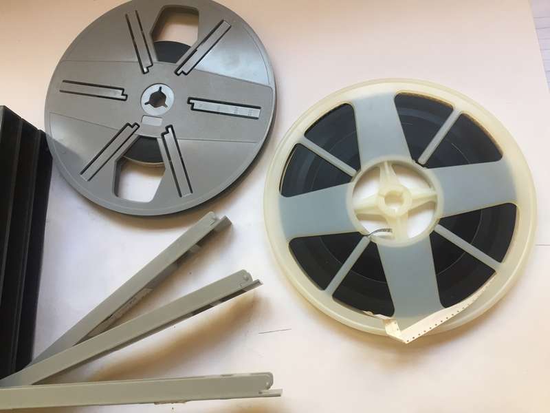 8 mm. FILM REELS X 2 , 180 mm. / 7 ins. diam. IN FLIP TOP STORAGE  DUST CASES ' FAR EAST & MAURITIUS