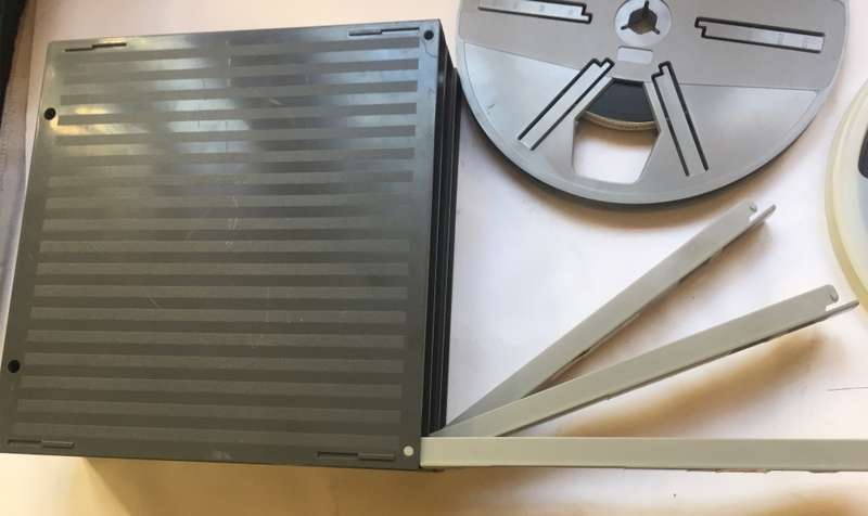 8 mm. FILM REELS X 2 , 180 mm. / 7 ins. diam. IN FLIP TOP STORAGE  DUST CASES ' FAR EAST & MAURITIUS