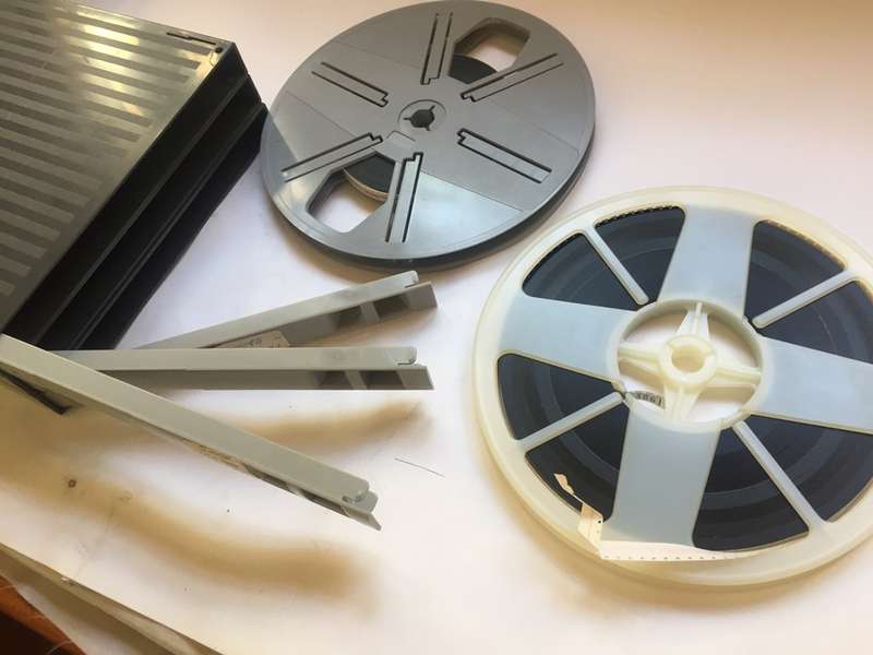 8 mm. FILM REELS X 2 , 180 mm. / 7 ins. diam. IN FLIP TOP STORAGE  DUST CASES ' FAR EAST & MAURITIUS