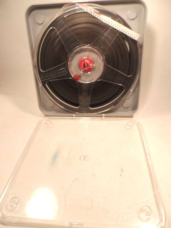 8 mm. NORIS FILM REEL , 180 mm. / 7 ins. diam. IN CLEAR , CRYSTAL STORAGE DUST CASE amateur footage