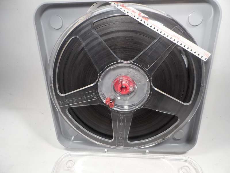 8 mm. NORIS FILM REEL , 180 mm. / 7 ins. diam. IN CLEAR , CRYSTAL STORAGE DUST CASE amateur footage