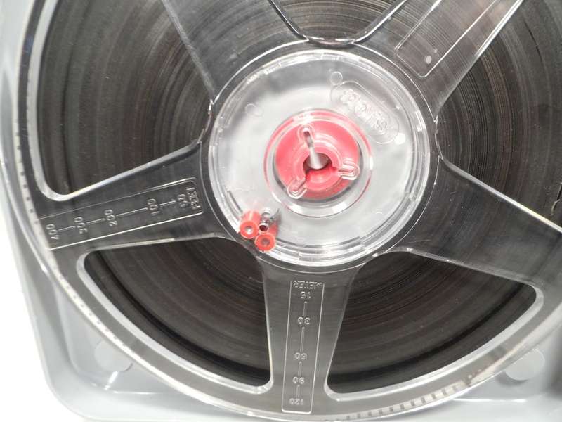 8 mm. NORIS FILM REEL , 180 mm. / 7 ins. diam. IN CLEAR , CRYSTAL STORAGE DUST CASE amateur footage