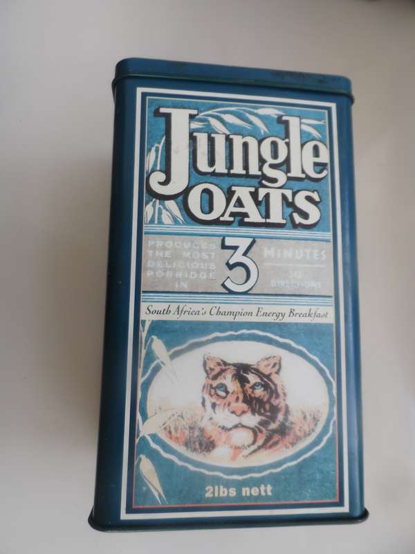 VINTAGE COLLECTIBLE , JUNGLE OATS,  LIDDED STORAGE TIN