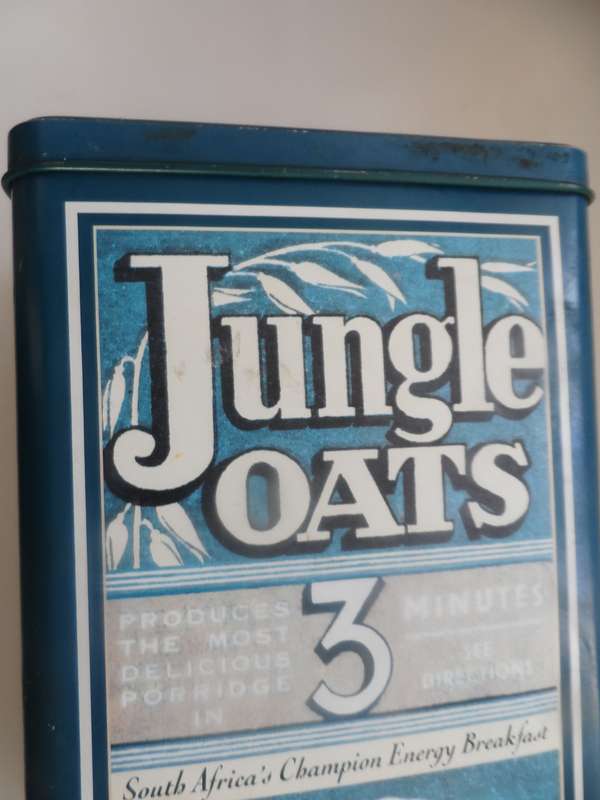 VINTAGE COLLECTIBLE , JUNGLE OATS,  LIDDED STORAGE TIN