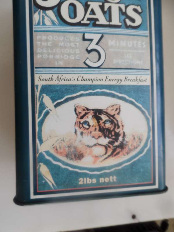 VINTAGE COLLECTIBLE , JUNGLE OATS,  LIDDED STORAGE TIN