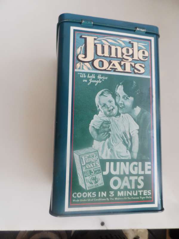 VINTAGE COLLECTIBLE , JUNGLE OATS,  LIDDED STORAGE TIN