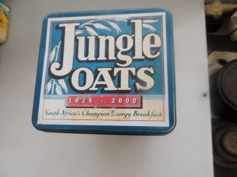 VINTAGE COLLECTIBLE , JUNGLE OATS,  LIDDED STORAGE TIN