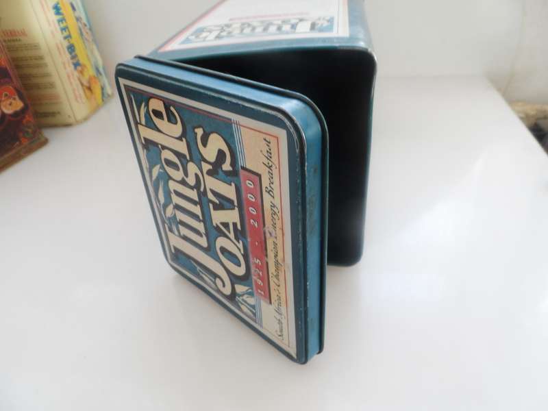 VINTAGE COLLECTIBLE , JUNGLE OATS,  LIDDED STORAGE TIN
