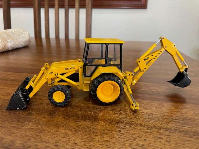 Conrad - Massey Ferguson MF 60HX 475 Backhoe Loader 1:35 Scale model
