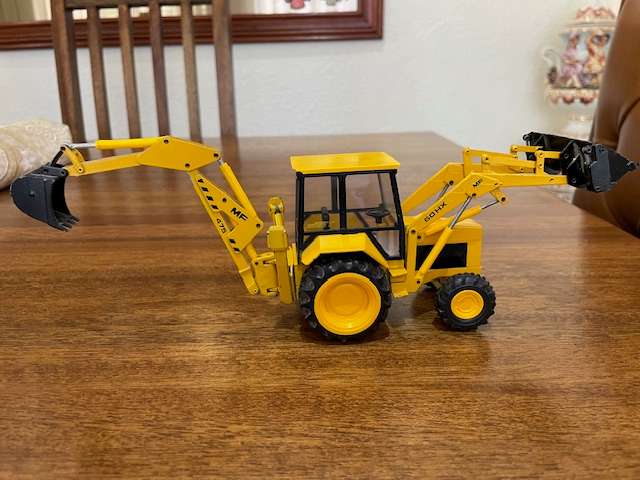 Conrad - Massey Ferguson MF 60HX 475 Backhoe Loader 1:35 Scale model