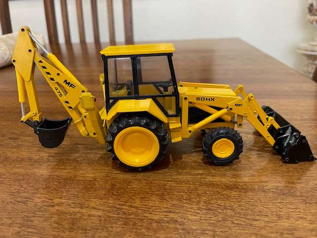 Conrad - Massey Ferguson MF 60HX 475 Backhoe Loader 1:35 Scale model