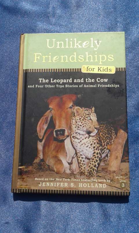 "Unlikely Friendships"  for kids aged 7 up.  Hard cover.