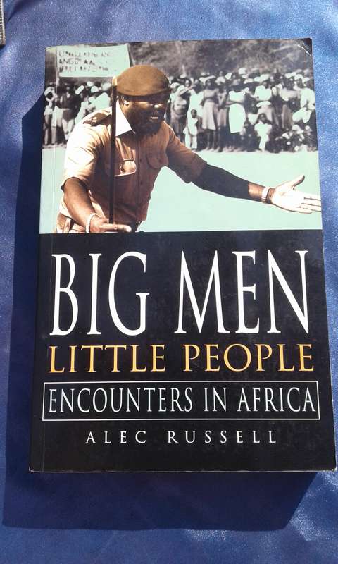 `Big Men  Little People"  Soft cover.