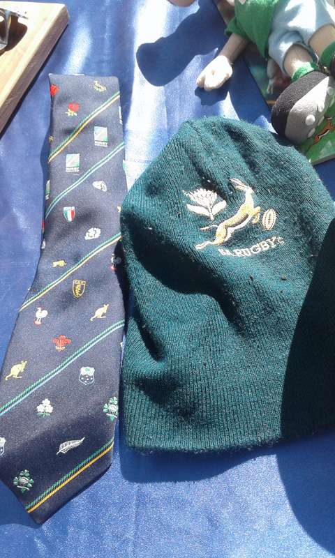 Rugby joblot.  1995 mascot, ties and ashtray.  Rugby ball, 320mm long, needs to be pumped.