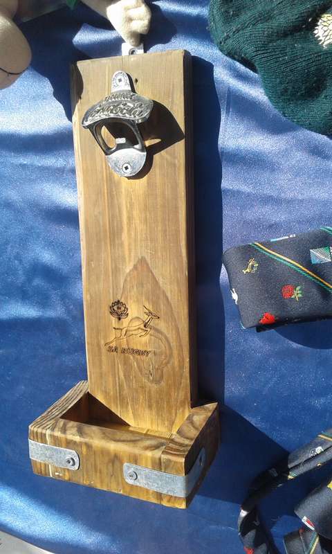Rugby joblot.  1995 mascot, ties and ashtray.  Rugby ball, 320mm long, needs to be pumped.