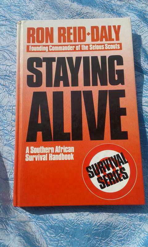"Staying Alive"  Ron Reid-Daly.  Hard cover.