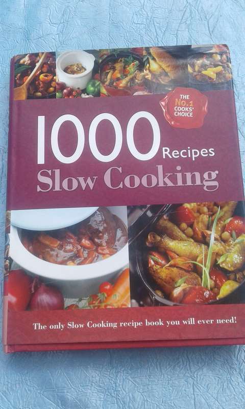 `1000 Recipes  Slow Cooking"  Hard cover.