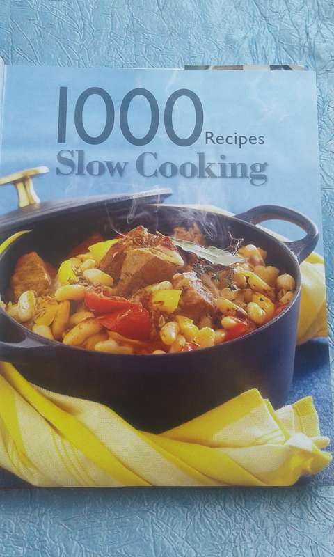 `1000 Recipes  Slow Cooking"  Hard cover.
