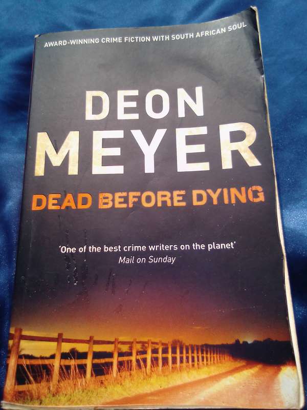 "Dead before Dying"  Deon Meyer.  Soft cover.