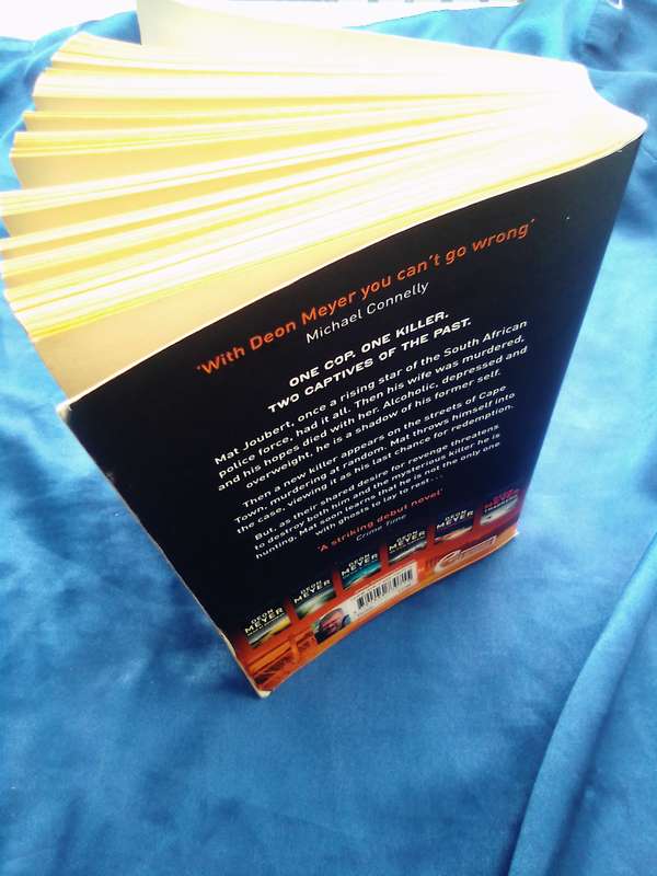 "Dead before Dying"  Deon Meyer.  Soft cover.