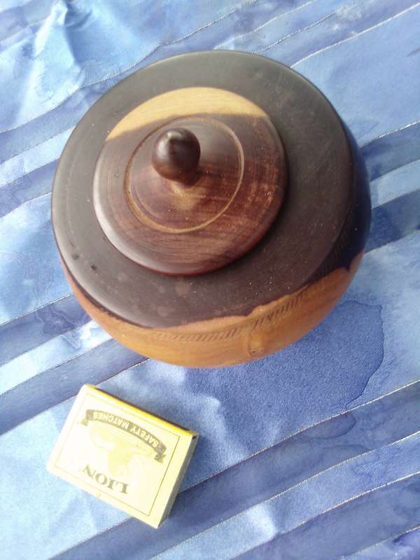Wooden tobacco jar.