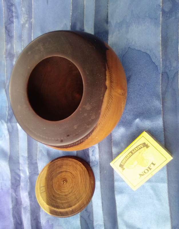 Wooden tobacco jar.
