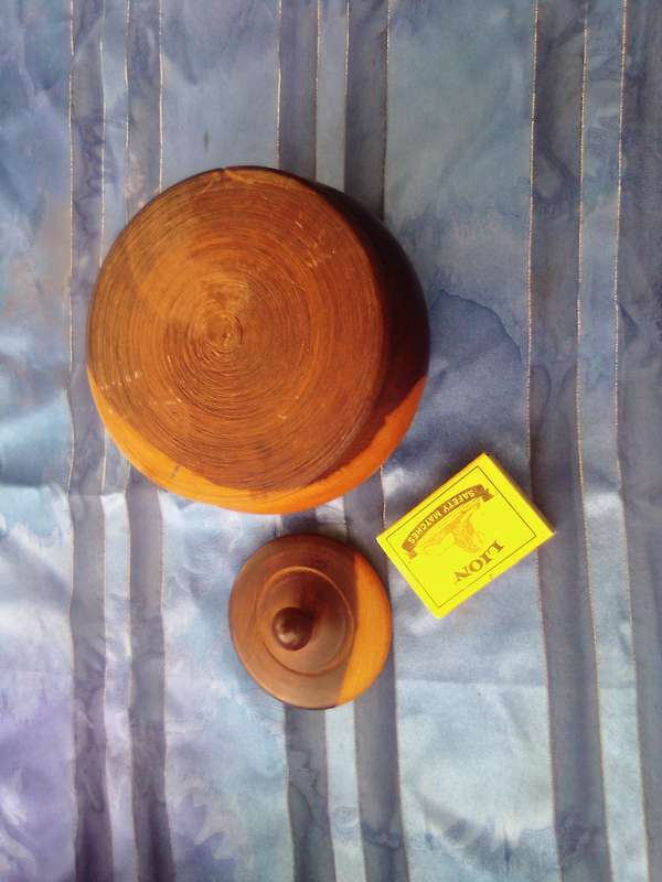 Wooden tobacco jar.