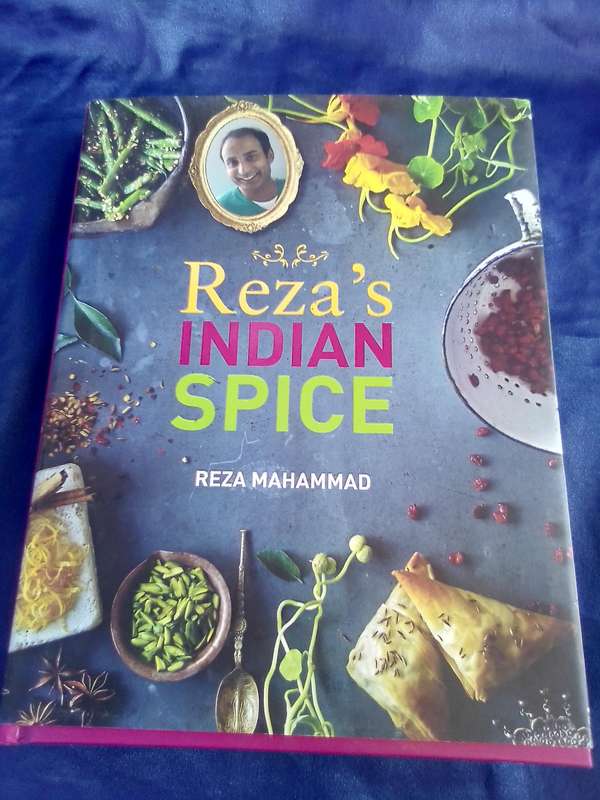 "Reza's Indian Spice"  Reza Mahammad.  Hard cover.