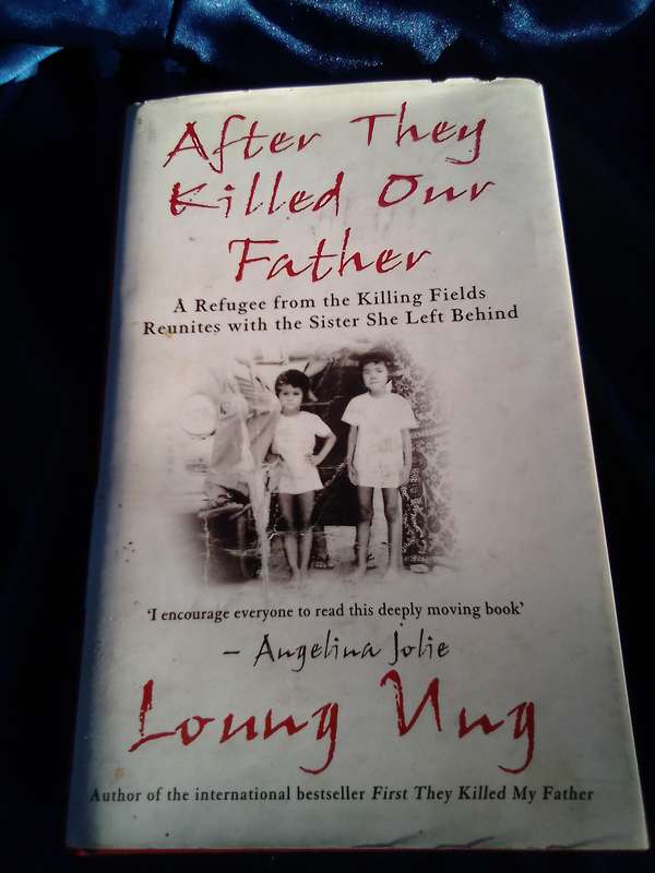"After they Killed Our Father"  Hard cover.