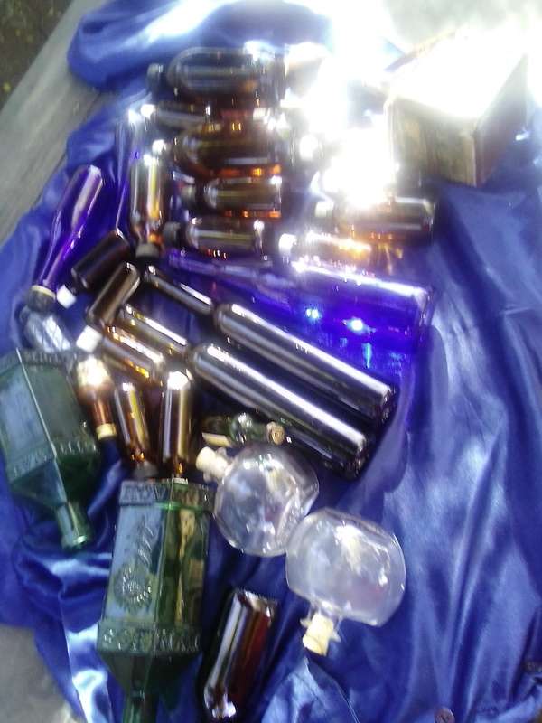 Coloured-glass bottles joblot.