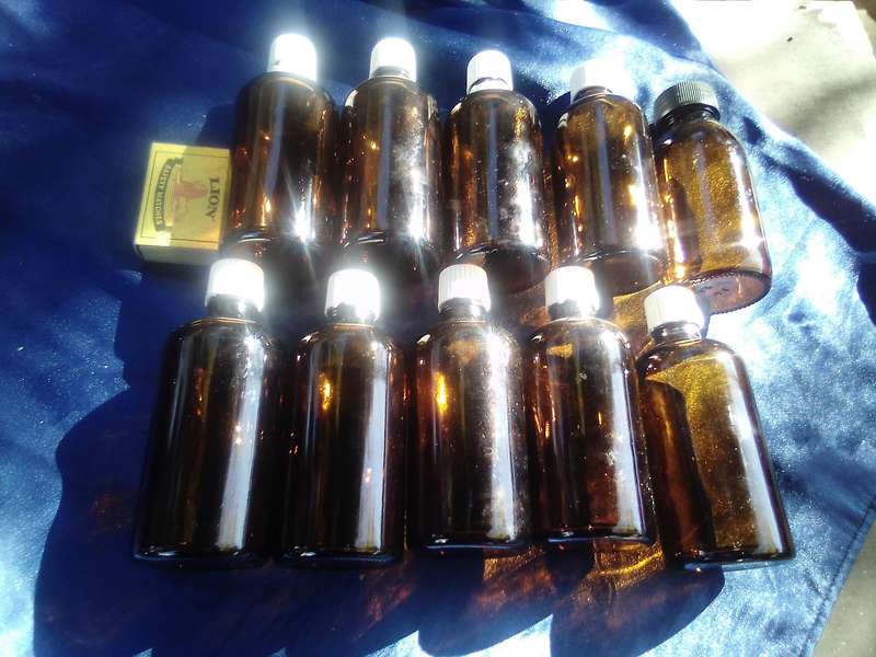 Coloured-glass bottles joblot.
