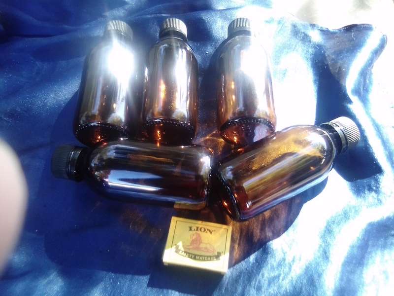 Coloured-glass bottles joblot.