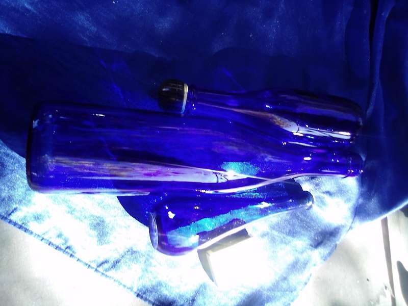 Coloured-glass bottles joblot.