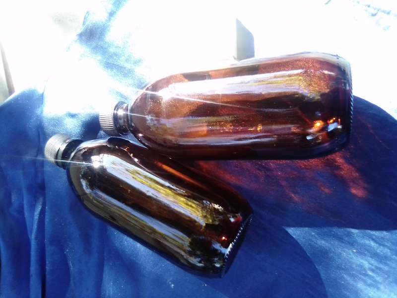 Coloured-glass bottles joblot.